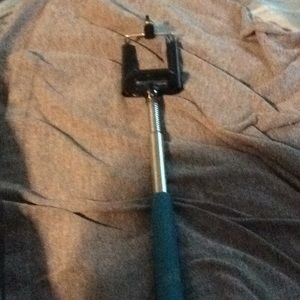 Selfie stick with blue handle